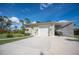 Garage with covered boat storage and large driveway at 5208 Churchill Rd, Port Charlotte, FL 33981