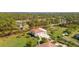 Single-story house with attached garage and a large yard at 5208 Churchill Rd, Port Charlotte, FL 33981