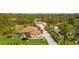 Single story house with a large backyard and attached garage at 5208 Churchill Rd, Port Charlotte, FL 33981