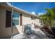 Home exterior showcasing architectural details and landscaping at 5208 Churchill Rd, Port Charlotte, FL 33981