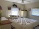 Main bedroom with a comfortable bed and ample storage at 5560 Holiday Park Blvd, North Port, FL 34287
