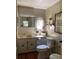 Clean bathroom with updated vanity and fixtures at 5560 Holiday Park Blvd, North Port, FL 34287