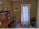 Home office with built-in shelving and desk at 5560 Holiday Park Blvd, North Port, FL 34287