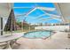 Screened pool with a patio for outdoor enjoyment at 7012 Denmark St, Englewood, FL 34224