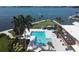 Resort-style pool and patio area with waterfront views at 11000 Placida Rd # 308, Placida, FL 33946