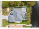 Aerial view of a single-Gathering home with pool and canal access at 13838 Begonia Cir, Port Charlotte, FL 33981