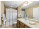 Bathroom with shower and vanity at 13838 Begonia Cir, Port Charlotte, FL 33981