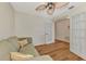 Bedroom with built-in shelving and French doors leading to another room at 14080 Willow Glen Ct # 233, Port Charlotte, FL 33953