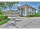 Two-story house with two-car garage and landscaping at 14080 Willow Glen Ct # 233, Port Charlotte, FL 33953