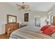 Main bedroom with wood flooring and ensuite bathroom access at 14080 Willow Glen Ct # 233, Port Charlotte, FL 33953