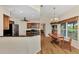 Eat-in kitchen with stainless steel appliances and breakfast bar at 14080 Willow Glen Ct # 233, Port Charlotte, FL 33953