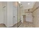 Updated bathroom with walk-in shower, tile flooring and a glass enclosure at 14080 Willow Glen Ct # 233, Port Charlotte, FL 33953