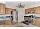 Modern kitchen with stainless steel appliances and granite countertops at 14080 Willow Glen Ct # 233, Port Charlotte, FL 33953
