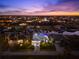 Stunning waterfront property at night, showcasing canal and neighborhood lights at 15784 Melport Cir, Port Charlotte, FL 33981