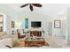 Open living room with coastal decor and ample natural light at 15784 Melport Cir, Port Charlotte, FL 33981