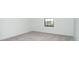 Bedroom with carpet flooring and a window providing natural light at 19524 Fishhawk Trl, Venice, FL 34293
