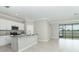 Island kitchen with stainless steel appliances and granite countertops at 19536 Fishhawk Trl, Venice, FL 34293