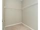 Empty walk-in closet, perfect for organizing and storing clothes and accessories with included wire shelving at 19536 Fishhawk Trl, Venice, FL 34293