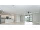 Modern kitchen with stainless steel appliances and granite countertops at 19536 Fishhawk Trl, Venice, FL 34293