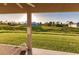 View from patio of grassy backyard at 263 W Pine Valley Ln, Rotonda West, FL 33947