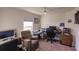 Bright home office featuring a large window and workspace at 263 W Pine Valley Ln, Rotonda West, FL 33947