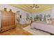 Spacious Primary bedroom with large windows, walk-in closet, and private access to the bathroom at 3060 Rivershore Ln, Port Charlotte, FL 33953