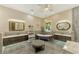 Elegant bathroom with a clawfoot tub and double vanity at 3060 Rivershore Ln, Port Charlotte, FL 33953