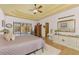Spacious main bedroom with pool view and large walk-in closet at 3060 Rivershore Ln, Port Charlotte, FL 33953