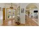 Elegant entryway with tile floors, arched doorways, and views into the living areas at 3060 Rivershore Ln, Port Charlotte, FL 33953