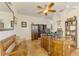 Spacious home office with wood desk and tiled floors at 3060 Rivershore Ln, Port Charlotte, FL 33953