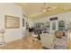 Bright and airy living room featuring terracotta floors and a comfortable seating area at 3060 Rivershore Ln, Port Charlotte, FL 33953