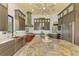 Spacious kitchen with large island, stainless steel appliances, and custom cabinetry at 3060 Rivershore Ln, Port Charlotte, FL 33953