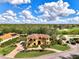 Luxury home with pool, golf course views, and expansive driveway at 3060 Rivershore Ln, Port Charlotte, FL 33953
