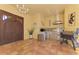 Outdoor kitchen with stainless steel appliances and tile flooring at 3060 Rivershore Ln, Port Charlotte, FL 33953