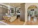 Gourmet kitchen with island, stainless steel appliances, and custom cabinetry at 3060 Rivershore Ln, Port Charlotte, FL 33953