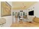 Spacious living room with terracotta tile floors, comfortable seating, and large windows at 3060 Rivershore Ln, Port Charlotte, FL 33953