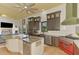 Open concept kitchen boasting a spacious island, modern cabinetry, and high-end appliances at 3060 Rivershore Ln, Port Charlotte, FL 33953