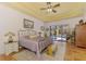 Primary bedroom with direct access to the pool area and luxurious amenities at 3060 Rivershore Ln, Port Charlotte, FL 33953