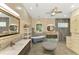 Spa-like bathroom with walk-in shower and soaking tub at 3060 Rivershore Ln, Port Charlotte, FL 33953