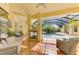 Relaxing pool and patio area with covered lanai and fireplace at 3060 Rivershore Ln, Port Charlotte, FL 33953