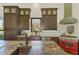 Gourmet kitchen with stainless steel appliances, custom cabinetry, and a large island at 3060 Rivershore Ln, Port Charlotte, FL 33953