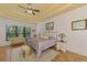 Relaxing Primary bedroom with a large bed, plenty of natural light, and tile flooring at 3060 Rivershore Ln, Port Charlotte, FL 33953
