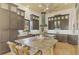 Modern kitchen boasts granite countertops, ample cabinetry, and a large island at 3060 Rivershore Ln, Port Charlotte, FL 33953