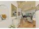 Bright entryway with tile floors, decorative accents, and views into living and dining areas at 3060 Rivershore Ln, Port Charlotte, FL 33953