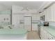Clean kitchen with white cabinets and stainless steel appliances at 3270 Bay Ridge Way, Port Charlotte, FL 33953