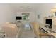 Relaxing Gathering room with TV, computer area, and comfy seating at 3270 Bay Ridge Way, Port Charlotte, FL 33953