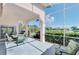 Spacious screened lanai with seating area overlooking a tranquil pond at 3270 Bay Ridge Way, Port Charlotte, FL 33953