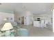Spacious living area with an open floor plan and views into kitchen at 3270 Bay Ridge Way, Port Charlotte, FL 33953