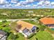 Single-Gathering home with a paved driveway and landscaping at 3270 Bay Ridge Way, Port Charlotte, FL 33953