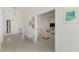 Bright entryway with light flooring and view to living room at 3270 Bay Ridge Way, Port Charlotte, FL 33953